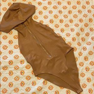 Bronze hooded body suit